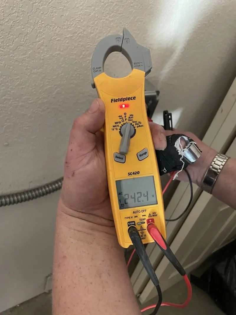 Voltage testing with clamp meter during Circuit Breaker Repair in Dayton